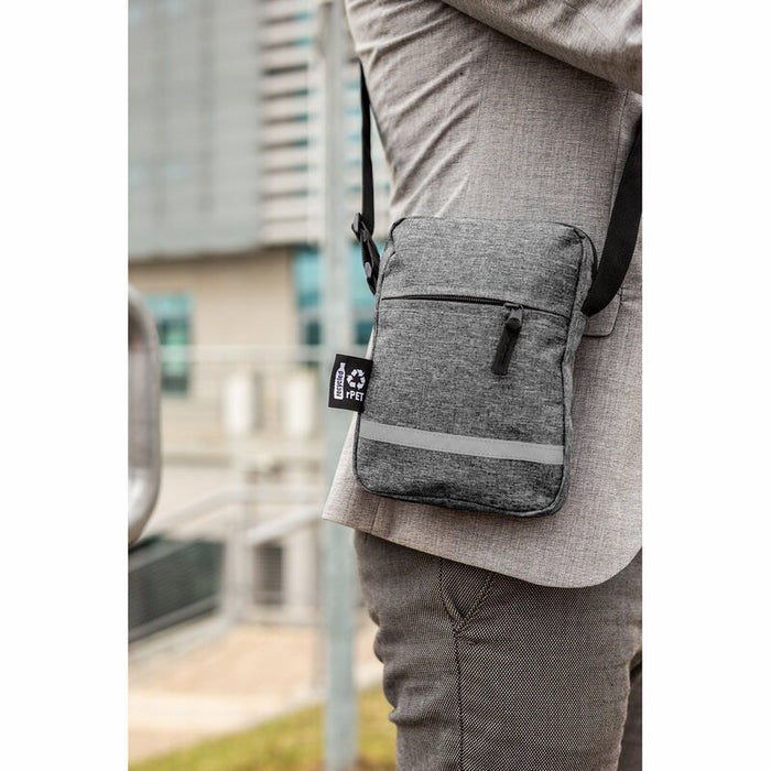 eco-friendly RPET shoulder bag worn crossbody by commuter, grey fabric