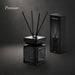 Aromatic diffuser in a gloss black glass bottle with black fibre reeds