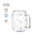 Double-walled glass mug with a snowflake design