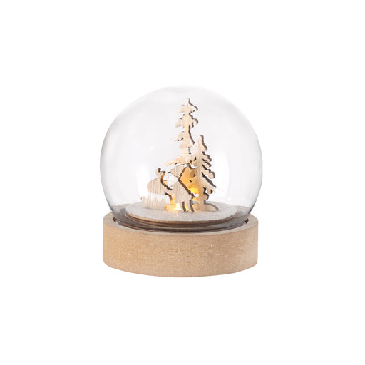 Snow globe with a festive scene on a round wooden base