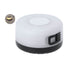 Compact round white and black portable LED light