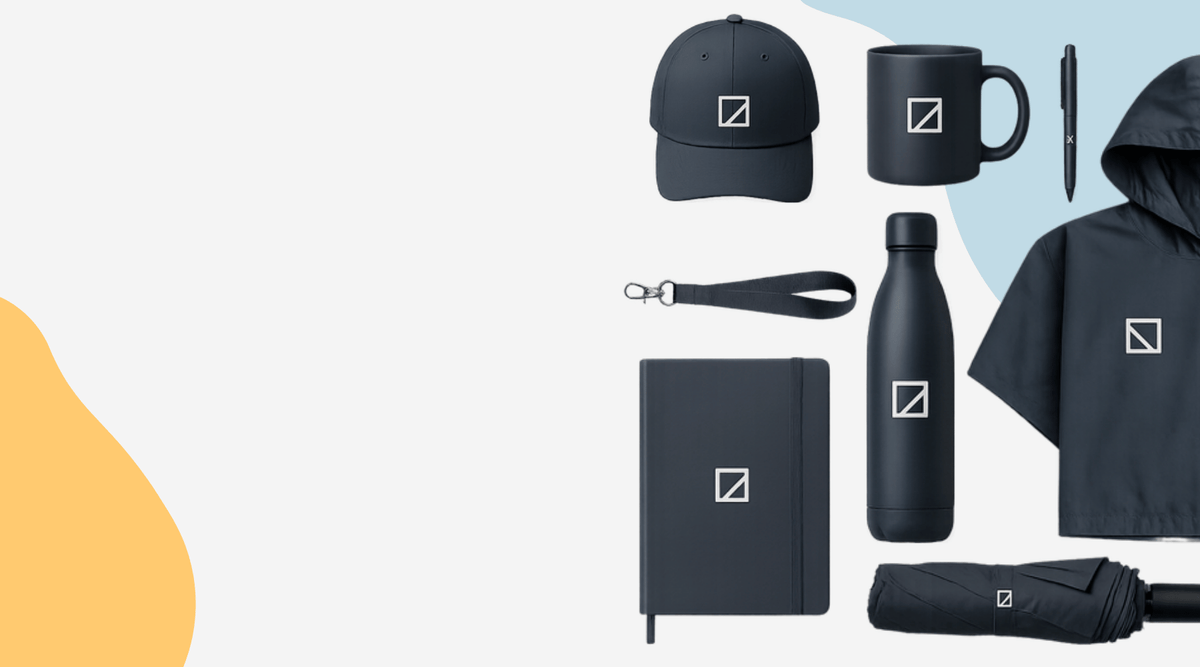 Navy blue branded merchandise laid out together: a cap, mug, pen, lanyard, notebook, water bottle, hooded top and umbrella, each printed with a white logo
